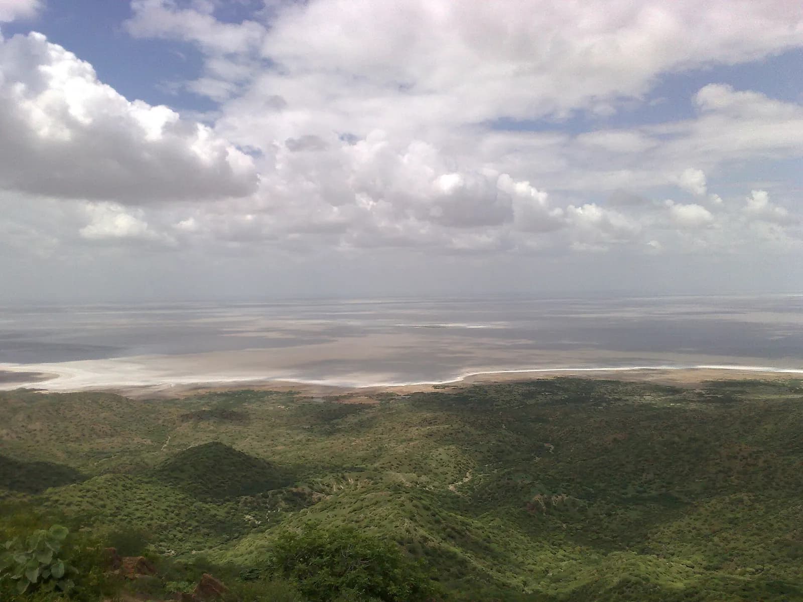 The white salt crust of the Great Rann of Kutch stretching to a flat horizon at dusk